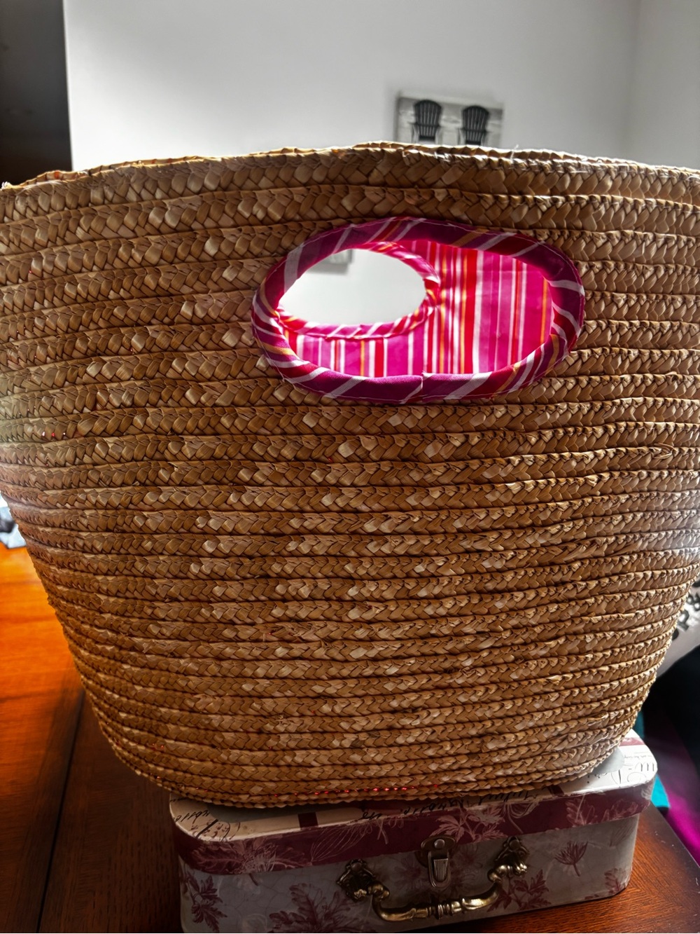 natural straw tote bag a vibrant pink and red striped fabric lining